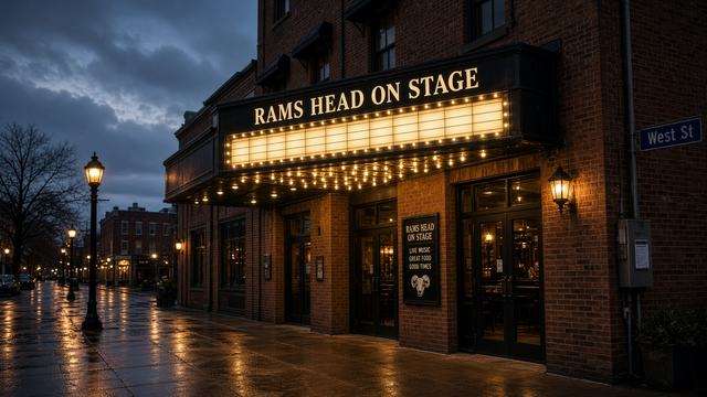 Rams Head On Stage marquee on West Street in Annapolis at dusk, empty sidewalk