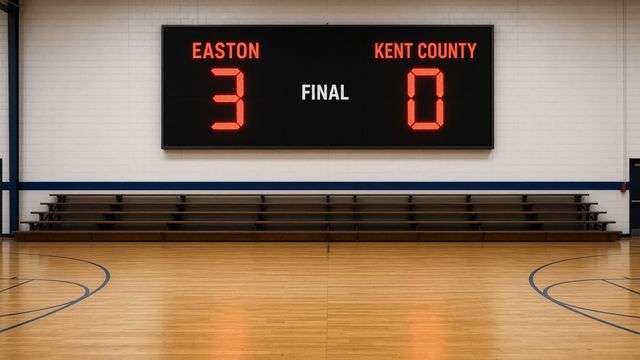 High school volleyball scoreboard after a road match
