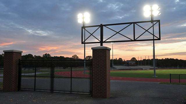 High school stadium lights and weekday athletics gates
